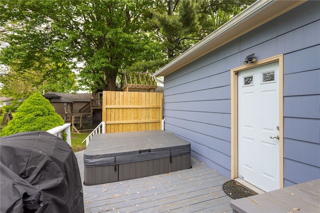 25 Selkirk Dr, Greece, NY 14626 - wooden deck featuring a covered hot tub and area for grilling