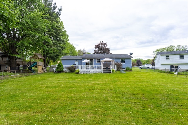 25 Selkirk Dr, Greece, NY 14626 - rear view of property with a playground and a wooden deck