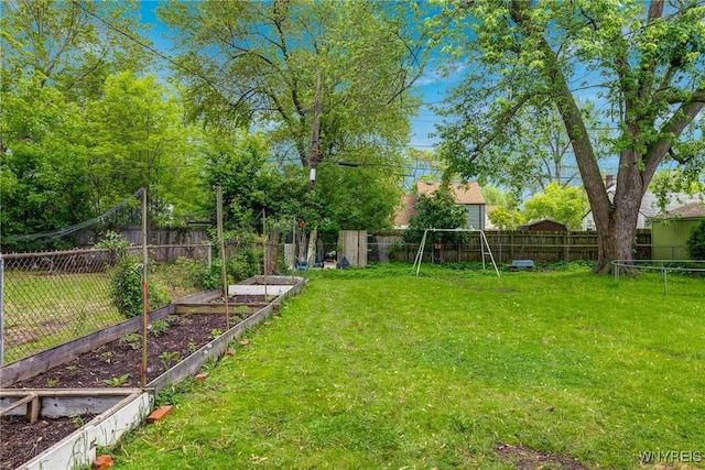 1597 Kensington Ave, Cheektowaga, NY 14215 - view of yard featuring a garden