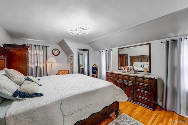 1597 Kensington Ave, Cheektowaga, NY 14215 - bedroom with lofted ceiling and light wood-style flooring