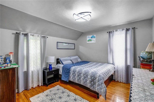 1597 Kensington Ave, Cheektowaga, NY 14215 - bedroom with lofted ceiling and light wood-type flooring