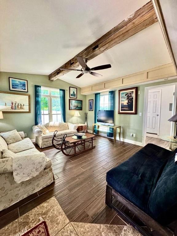 450 Stover Rd, Tyrone, NY 14815 - living area with ceiling fan, wood finished floors, healthy amount of natural light, and baseboards