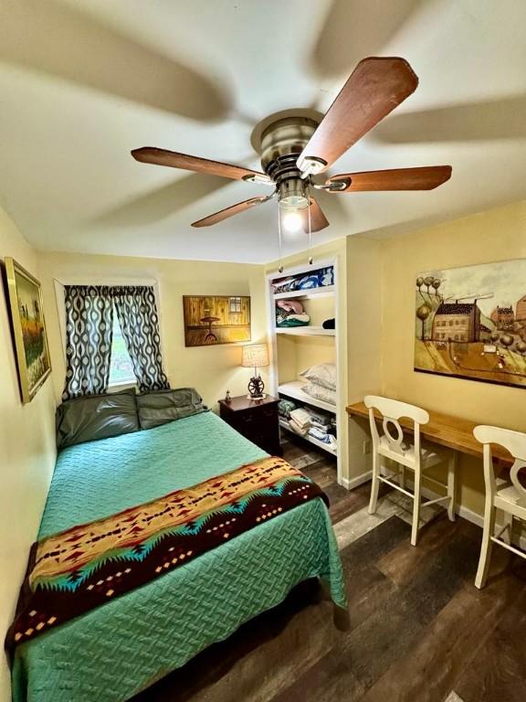 450 Stover Rd, Tyrone, NY 14815 - bedroom featuring dark wood finished floors, ceiling fan, and baseboards