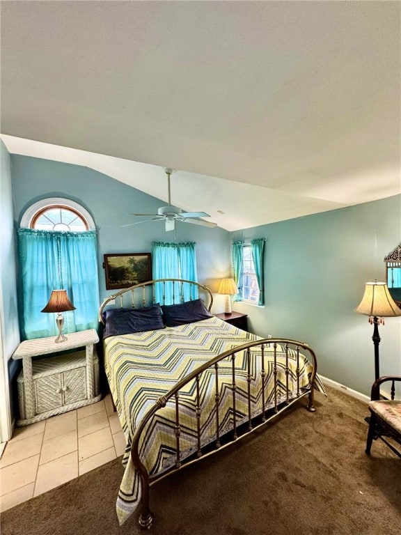 450 Stover Rd, Tyrone, NY 14815 - carpeted bedroom with multiple windows, a ceiling fan, baseboards, and tile patterned floors