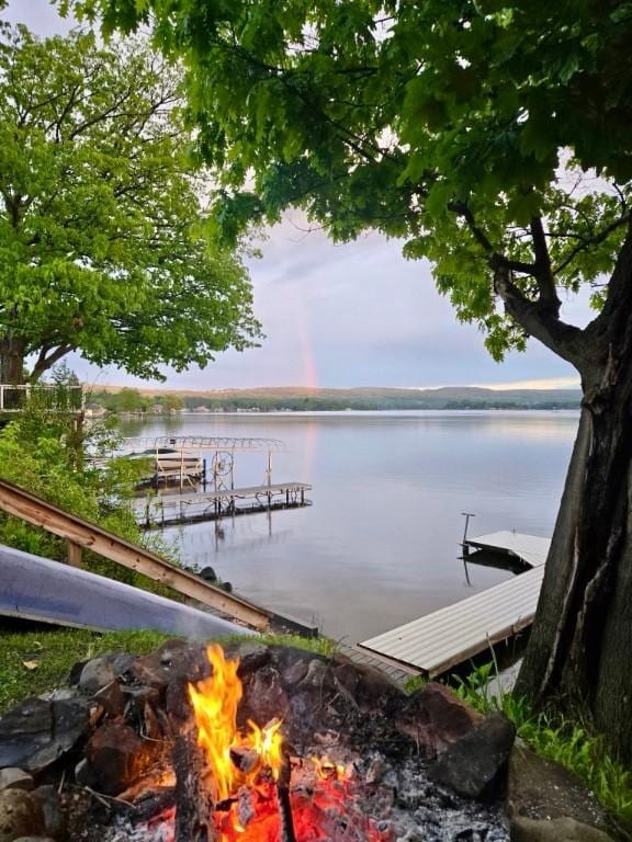 450 Stover Rd, Tyrone, NY 14815 - dock area featuring a fire pit and a water view