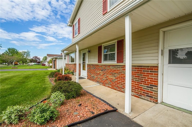 63 Shadywood Dr, Gates, NY 14606 - porch with a yard and a garage