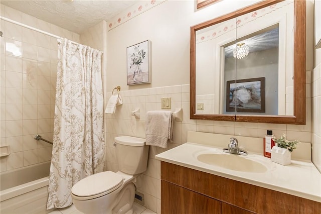 63 Shadywood Dr, Gates, NY 14606 - bathroom with toilet, vanity, tile walls, shower / tub combo, and a textured ceiling