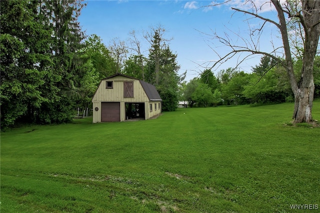 3955 Four Rod Rd Unit S, Marilla, NY 14052 - view of green lawn featuring a detached garage, an outdoor structure, and view of scattered trees