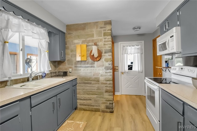 3955 Four Rod Rd Unit S, Marilla, NY 14052 - kitchen with white appliances, a sink, gray cabinets, and healthy amount of natural light