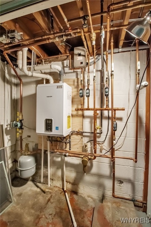 3955 Four Rod Rd Unit S, Marilla, NY 14052 - utility room featuring tankless water heater