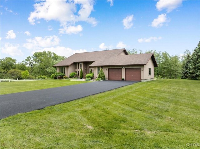 5 Byron Ln, Kirkland, NY 13323 - view of front of property with a garage and asphalt driveway