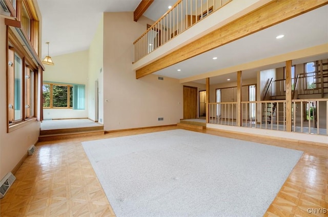 5 Byron Ln, Kirkland, NY 13323 - unfurnished living room featuring baseboards, beam ceiling, high vaulted ceiling, and recessed lighting