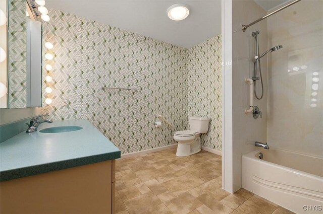 5 Byron Ln, Kirkland, NY 13323 - full bathroom with wallpapered walls, vanity, toilet, shower / bath combination, and an accent wall