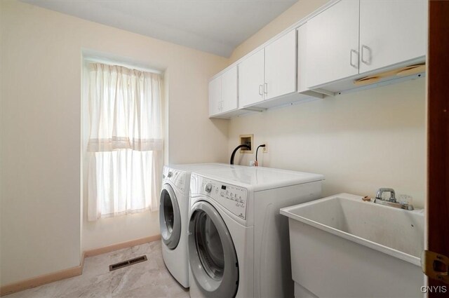 5 Byron Ln, Kirkland, NY 13323 - washroom featuring cabinet space, separate washer and dryer, and baseboards