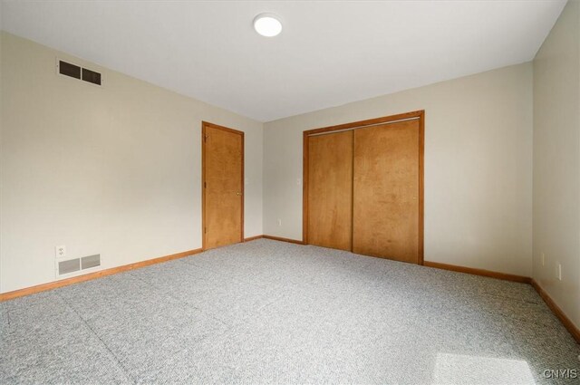 5 Byron Ln, Kirkland, NY 13323 - unfurnished bedroom with carpet flooring, baseboards, and a closet