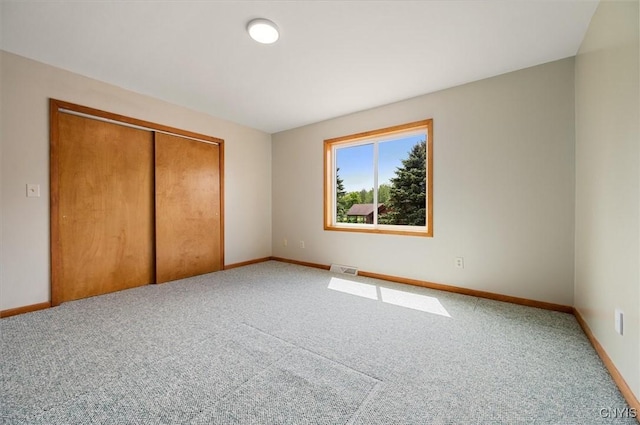 5 Byron Ln, Kirkland, NY 13323 - unfurnished bedroom with carpet, baseboards, and a closet