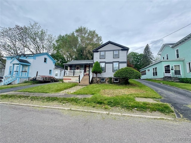 7 High St, Lyons, NY 14489 - view of front of home featuring a porch