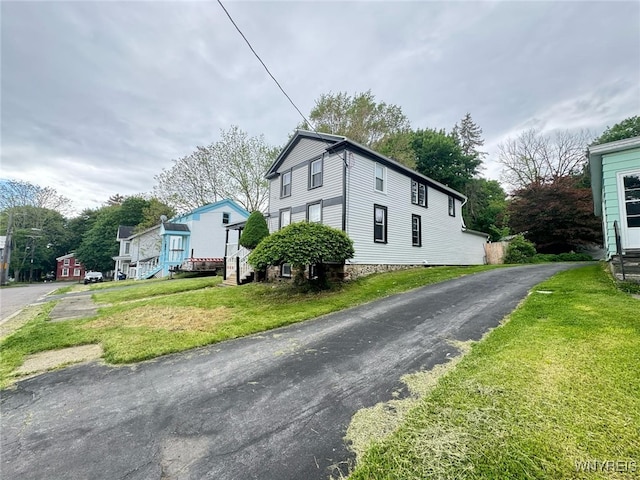 7 High St, Lyons, NY 14489 - view of property exterior with a yard