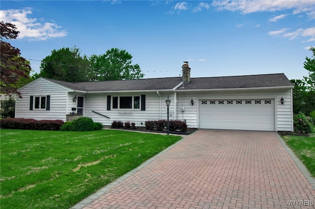 69 Coolidge Ave, Lockport-City, NY 14094 - ranch-style home featuring a garage, a chimney, a front yard, and decorative driveway