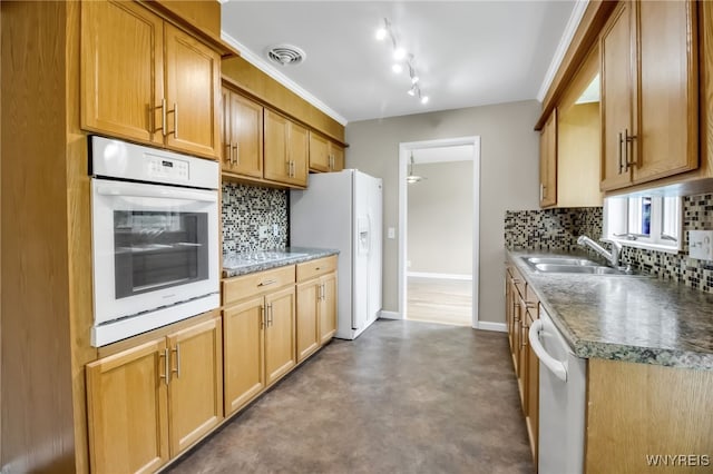 69 Coolidge Ave, Lockport-City, NY 14094 - kitchen with white appliances, a sink, backsplash, concrete floors, and baseboards