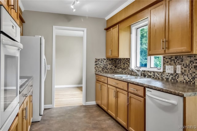 69 Coolidge Ave, Lockport-City, NY 14094 - kitchen featuring white appliances, a sink, tasteful backsplash, and dark countertops