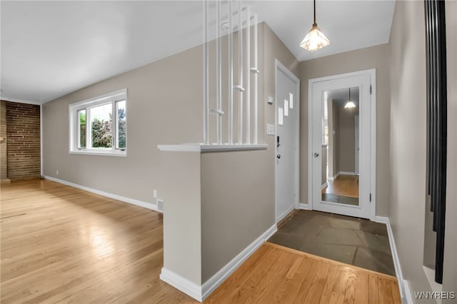 69 Coolidge Ave, Lockport-City, NY 14094 - foyer featuring wood-type flooring and baseboards