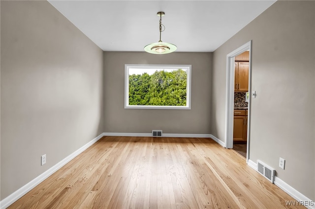 69 Coolidge Ave, Lockport-City, NY 14094 - unfurnished room featuring light wood-style floors and baseboards