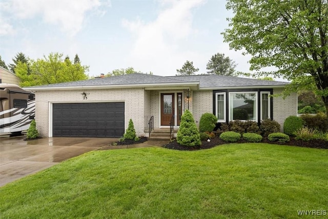 23 Bittersweet Ln, Orchard Park, NY 14127 - ranch-style home with brick siding, a garage, driveway, and a front yard