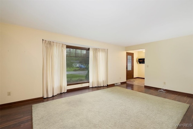 23 Bittersweet Ln, Orchard Park, NY 14127 - unfurnished room featuring dark wood-type flooring and baseboards