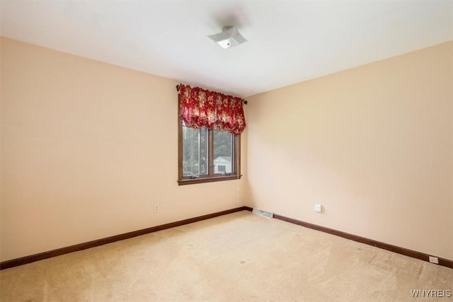 23 Bittersweet Ln, Orchard Park, NY 14127 - empty room featuring light carpet and baseboards