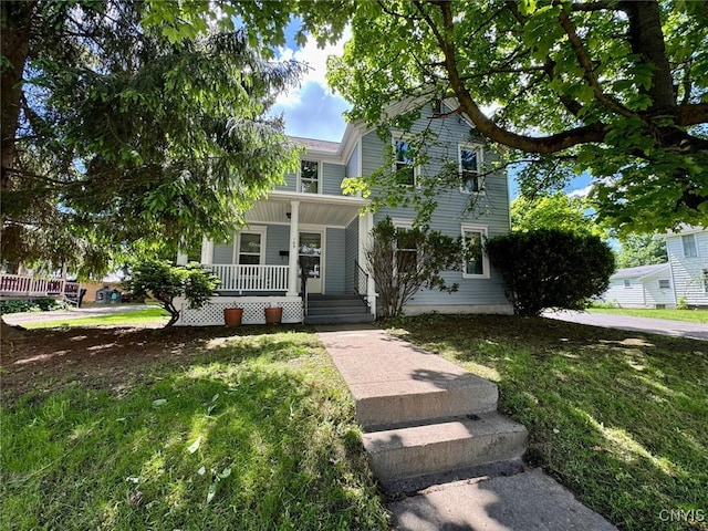 109 Clinton Ave, Cortland, NY 13045 - view of front of property featuring a porch and a front lawn