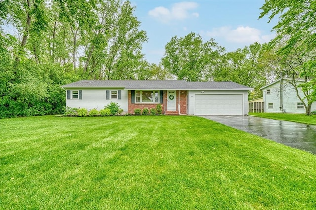 1 Ashton Dr, Gates, NY 14624 - ranch-style house featuring driveway, a garage, a front lawn, and brick siding