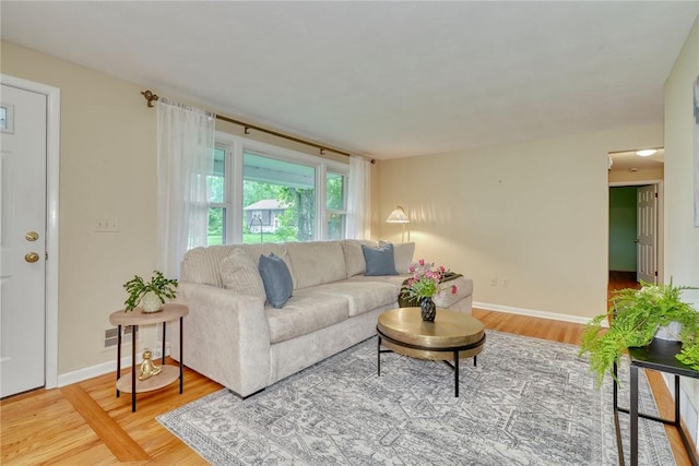 1 Ashton Dr, Gates, NY 14624 - living area featuring wood finished floors and baseboards