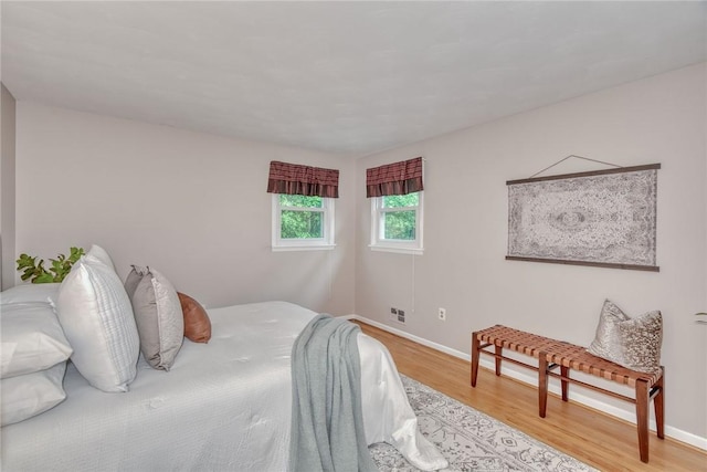 1 Ashton Dr, Gates, NY 14624 - bedroom with light wood-type flooring and baseboards