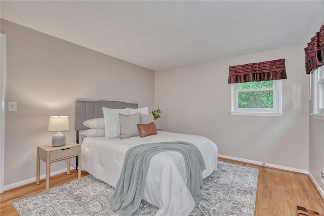 1 Ashton Dr, Gates, NY 14624 - bedroom featuring wood finished floors and baseboards