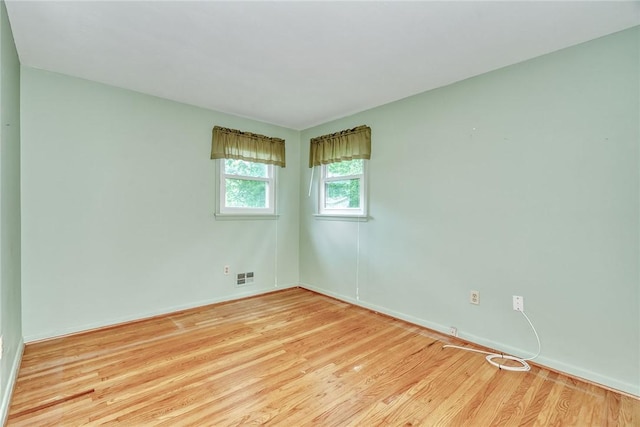 1 Ashton Dr, Gates, NY 14624 - unfurnished room with light wood-style floors and baseboards