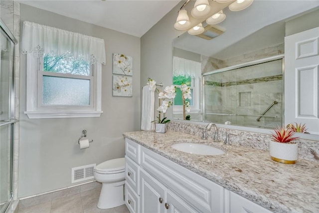 1 Ashton Dr, Gates, NY 14624 - bathroom with toilet, vanity, a tile shower, and tile patterned flooring