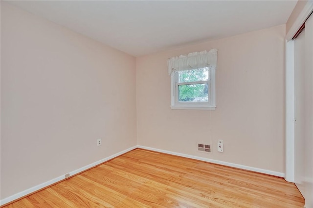 1 Ashton Dr, Gates, NY 14624 - empty room featuring wood finished floors and baseboards