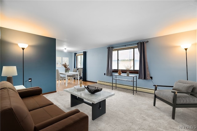 3898 Ridge Lea Rd Unit B, Amherst, NY 14228 - living room with a baseboard heating unit, light carpet, and baseboards
