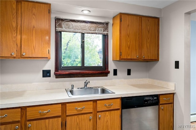 3898 Ridge Lea Rd Unit B, Amherst, NY 14228 - kitchen featuring stainless steel dishwasher, a sink, light countertops, and brown cabinetry