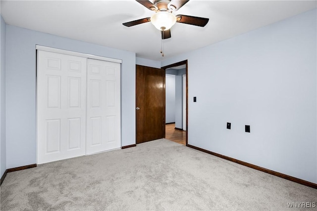 3898 Ridge Lea Rd Unit B, Amherst, NY 14228 - unfurnished bedroom featuring carpet floors, baseboards, a closet, and a ceiling fan