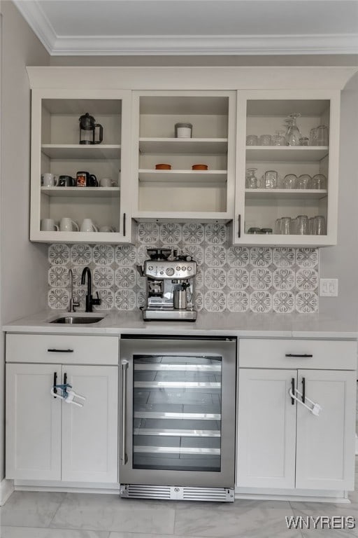 110 Hunt Club Cir, Amherst, NY 14051 - indoor wet bar featuring beverage cooler, crown molding, and backsplash