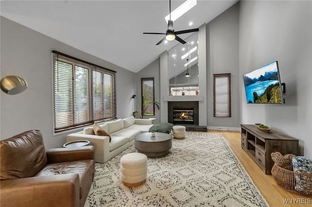110 Hunt Club Cir, Amherst, NY 14051 - living area featuring ceiling fan, light wood finished floors, high vaulted ceiling, a glass covered fireplace, and recessed lighting