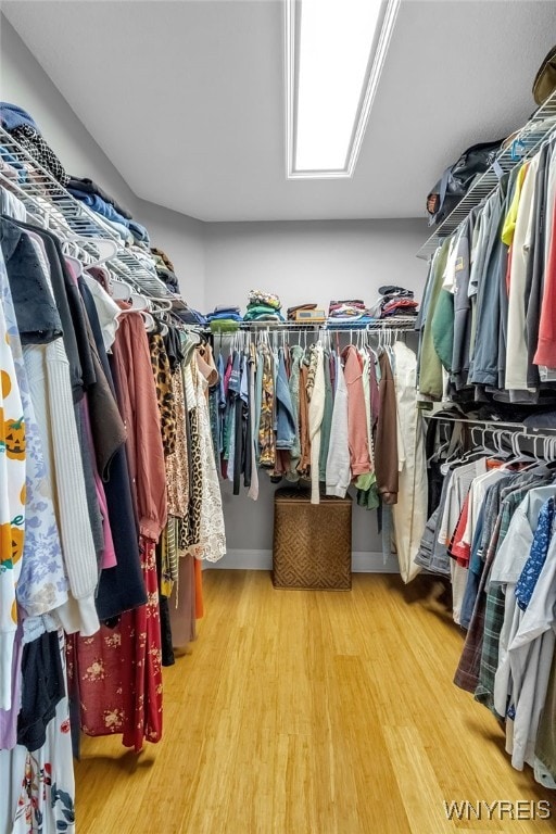 110 Hunt Club Cir, Amherst, NY 14051 - walk in closet featuring wood finished floors