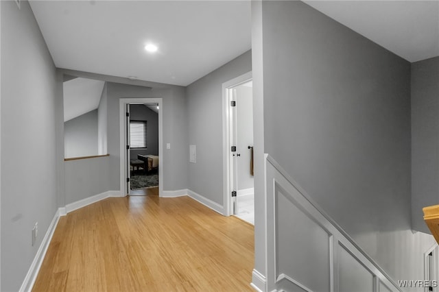 110 Hunt Club Cir, Amherst, NY 14051 - corridor with an upstairs landing, light wood-type flooring, baseboards, and recessed lighting
