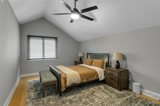 110 Hunt Club Cir, Amherst, NY 14051 - bedroom with light wood finished floors, lofted ceiling, baseboards, and a ceiling fan