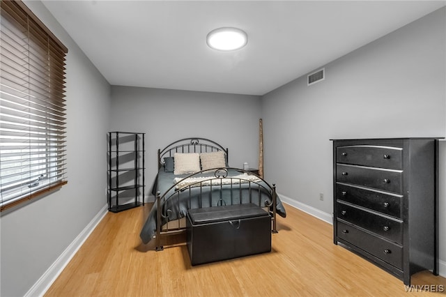 110 Hunt Club Cir, Amherst, NY 14051 - bedroom featuring wood finished floors and baseboards