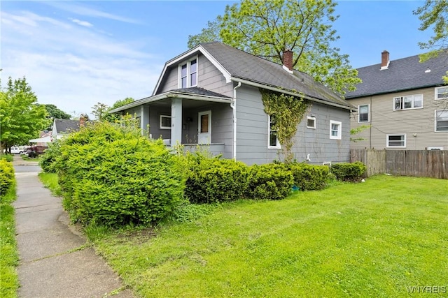 22 Bruce St, Buffalo, NY 14214 - view of home's exterior featuring a chimney