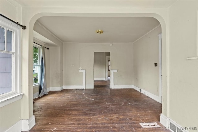 22 Bruce St, Buffalo, NY 14214 - spare room with arched walkways, hardwood / wood-style floors, ornamental molding, and baseboards