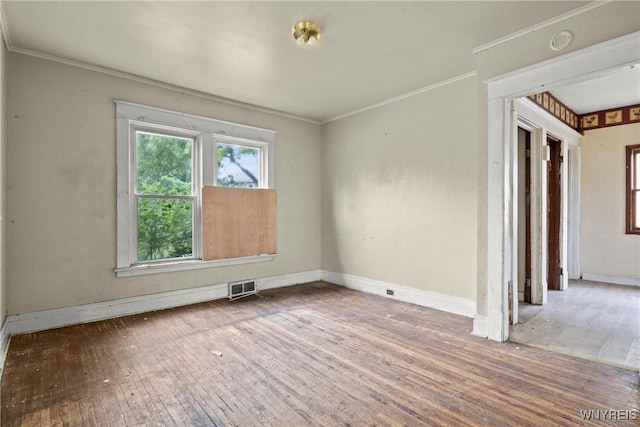 22 Bruce St, Buffalo, NY 14214 - unfurnished room with wood-type flooring, ornamental molding, and baseboards